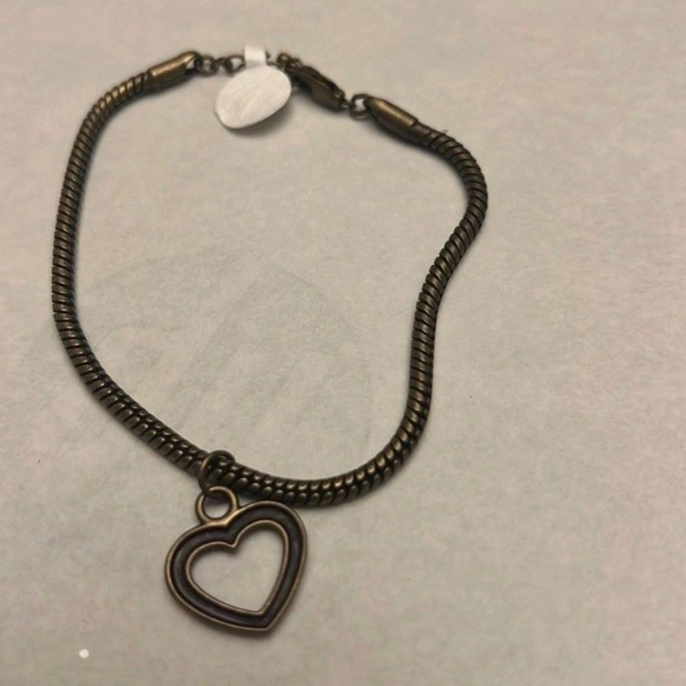 Handcrafted antique gold tone heart bracelet with built in extender.